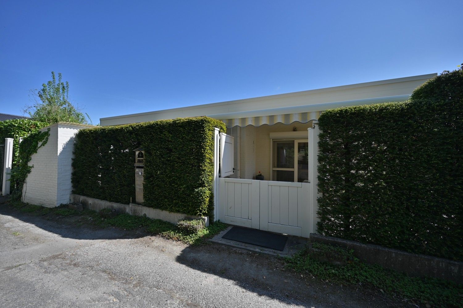 Charmante, instapklare bungalow met 3 slaapkamers en inpandige garage, schitterend gelegen tegen de bergrug van Kanne foto 31