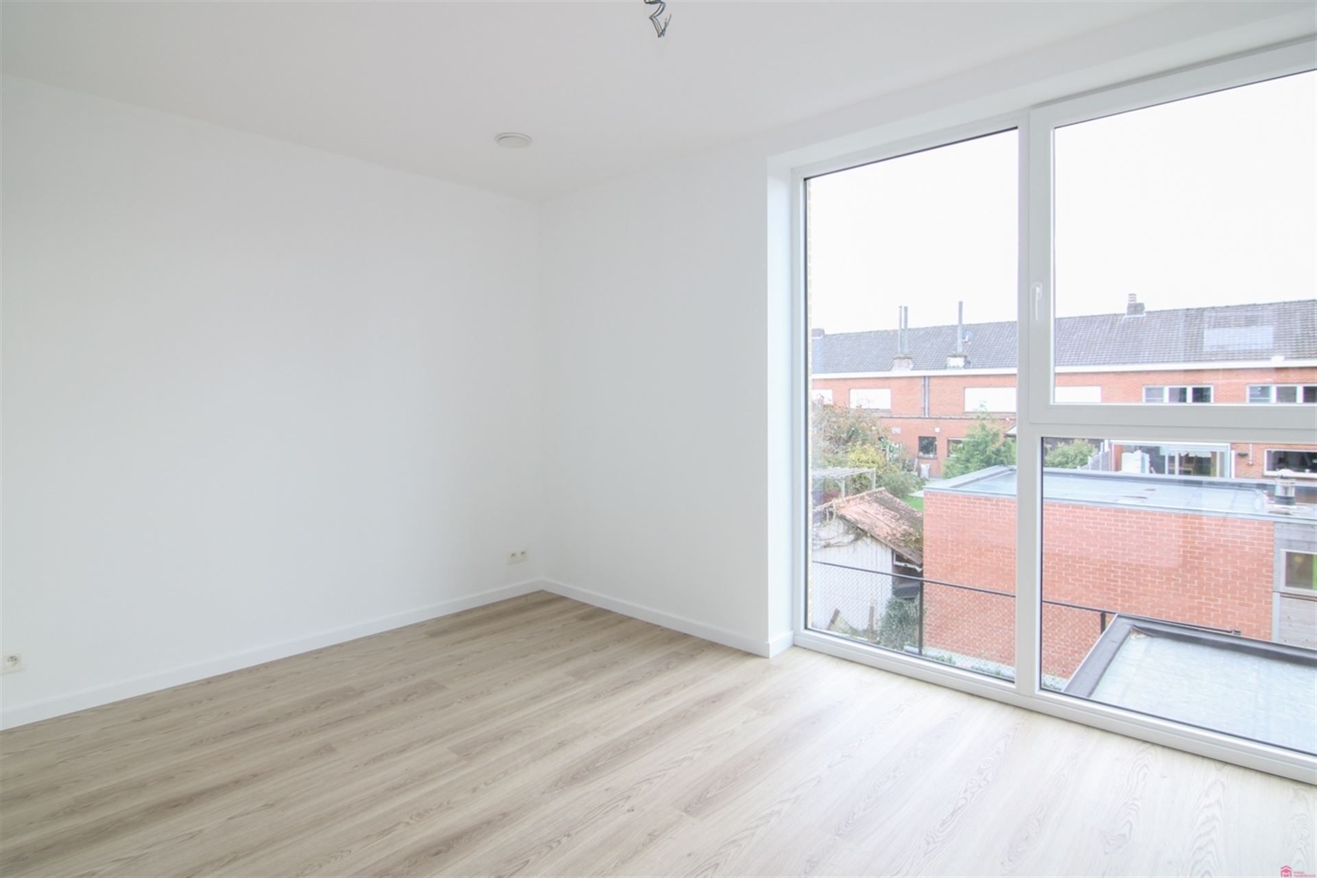 Energiezuinige woning te huur nabij het centrum van Wevelgem foto 9