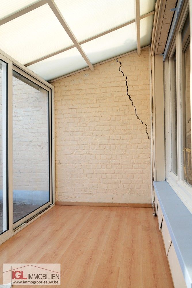 Gezinswoning met 3 slaapkamers en westgerichte tuin in rustige buurt van Sint-Pieters-Leeuw foto 6