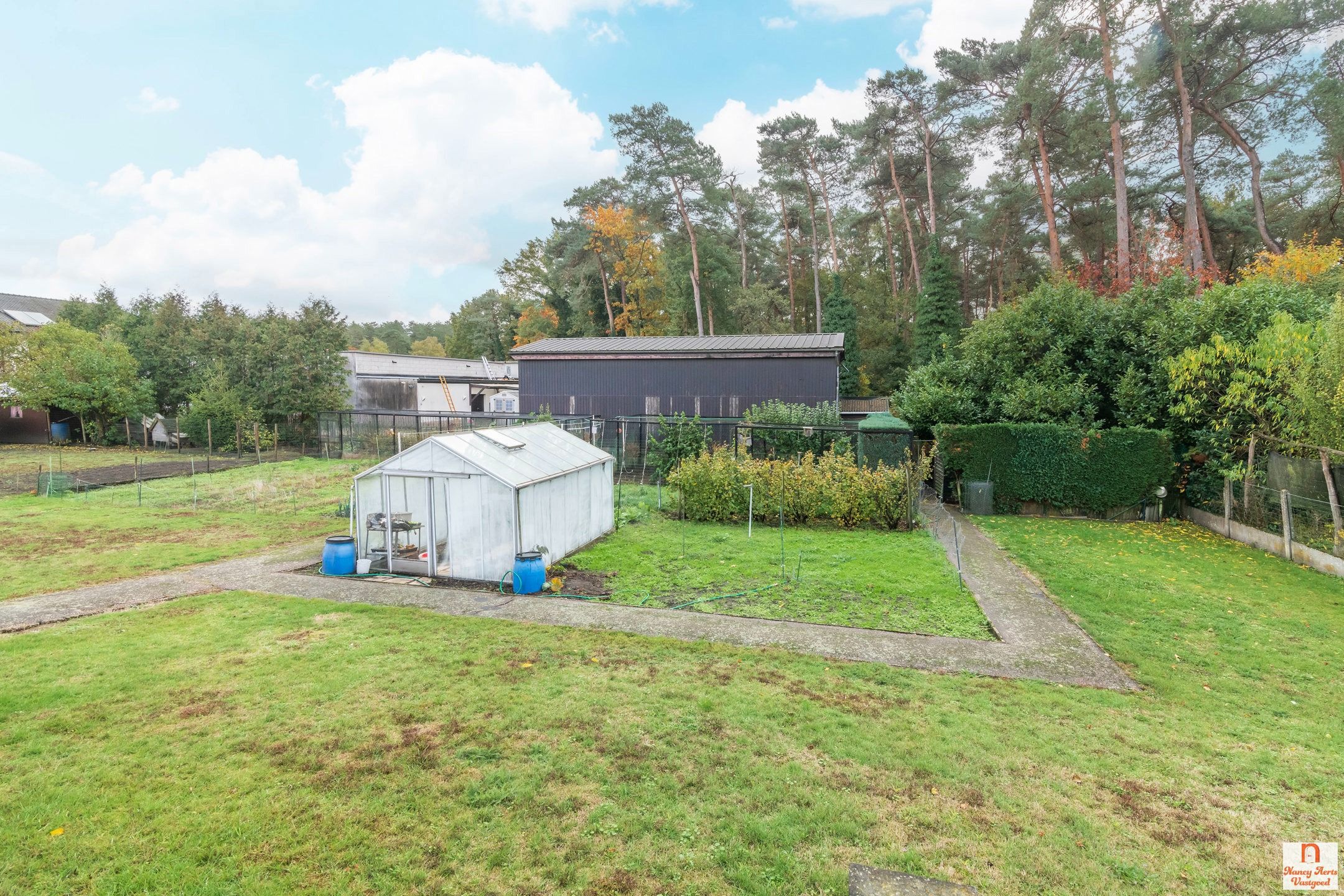 Sfeervolle thuis op een uitzonderlijke ligging in het groen foto 6