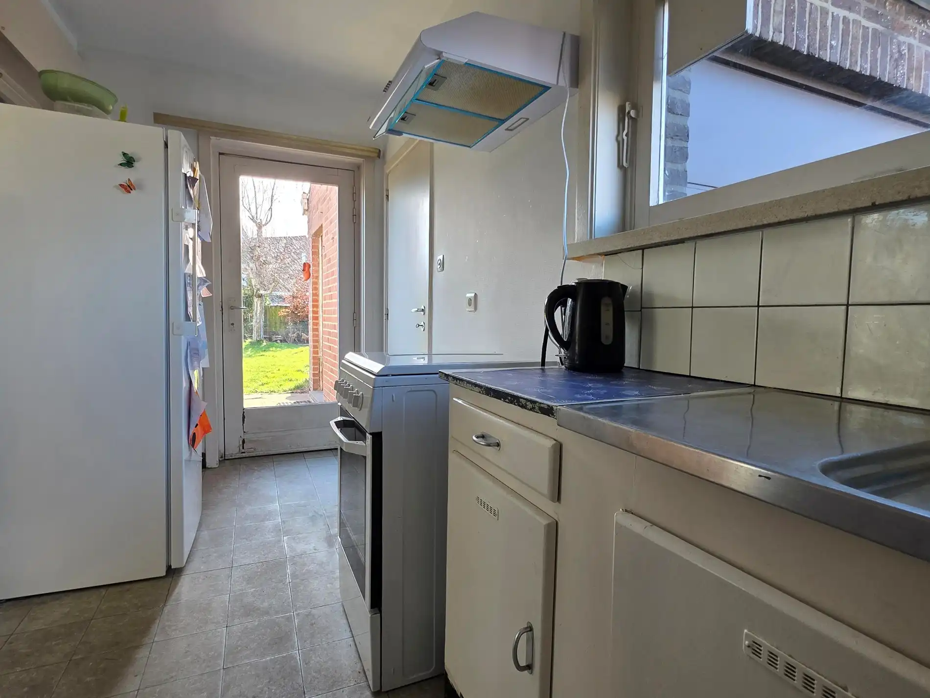 Stevige woning met betonstructuur te koop in Kuurne, eerste verdiep al volledig gerenoveerd foto 7