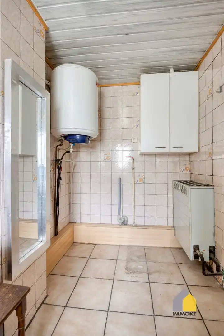 Te renoveren woning met 3 slpks op een perceel van 6 a 44 ca. foto 12