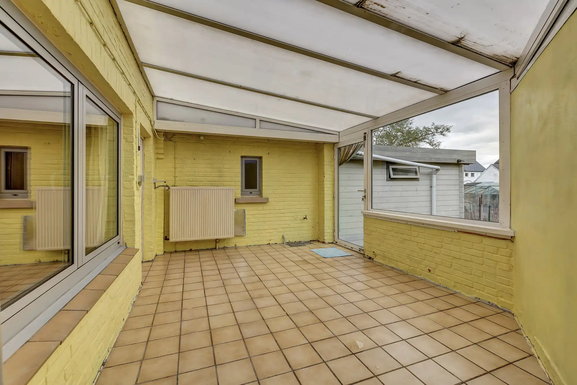 Halfopen bebouwing met garage en tuin in Ternat! foto 16