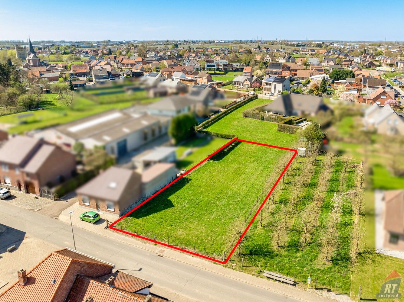 Bouwgrond voor open bebouwing in gegeerde buurt te Brustem foto 2