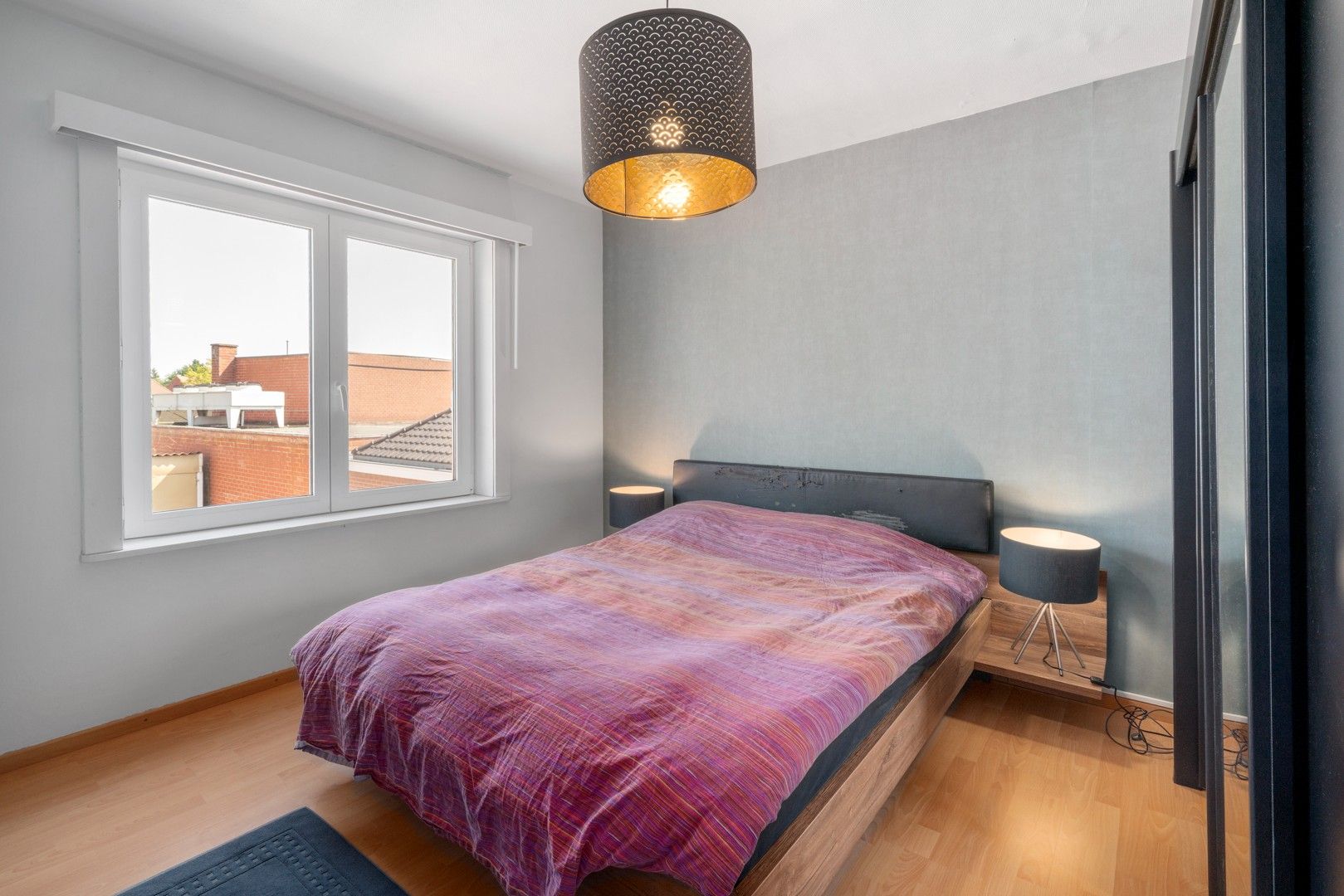 Halfopen woning met tuin en garages in het centrum van Nevele! foto 17