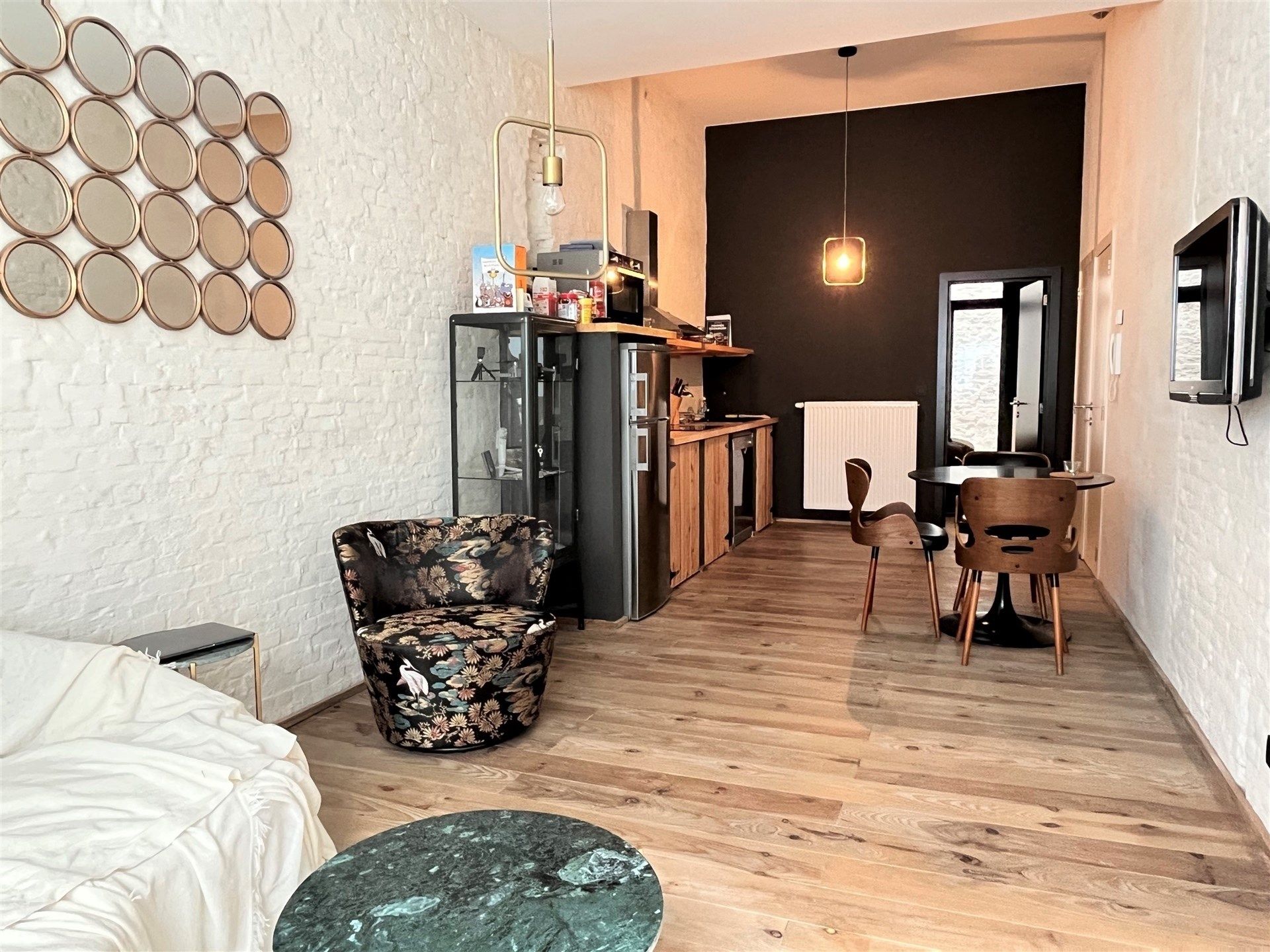 Gelijkvloers gemeubeld appartement op het Eilandje! foto {{pictureIndex}}