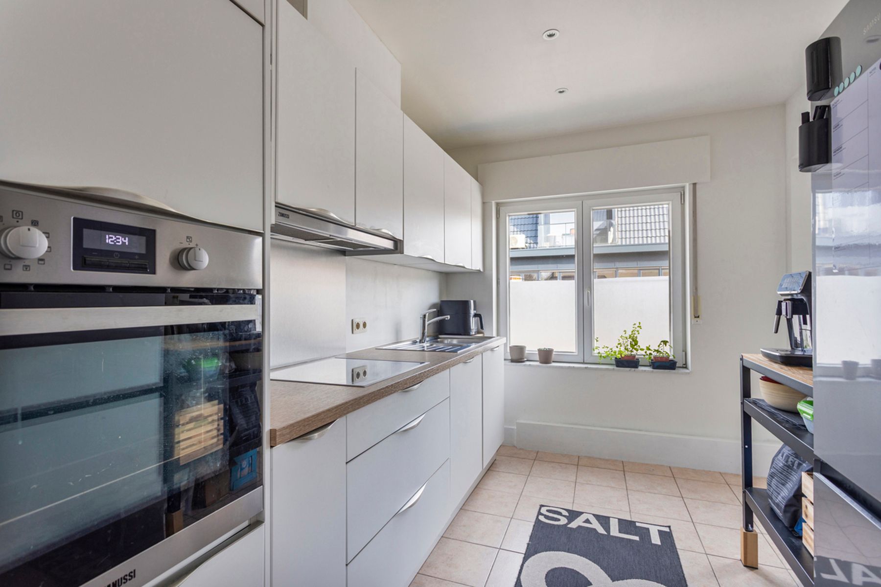 Opbrengsteigendom 2 appartementen en 2 commerciële ruimtes foto 19