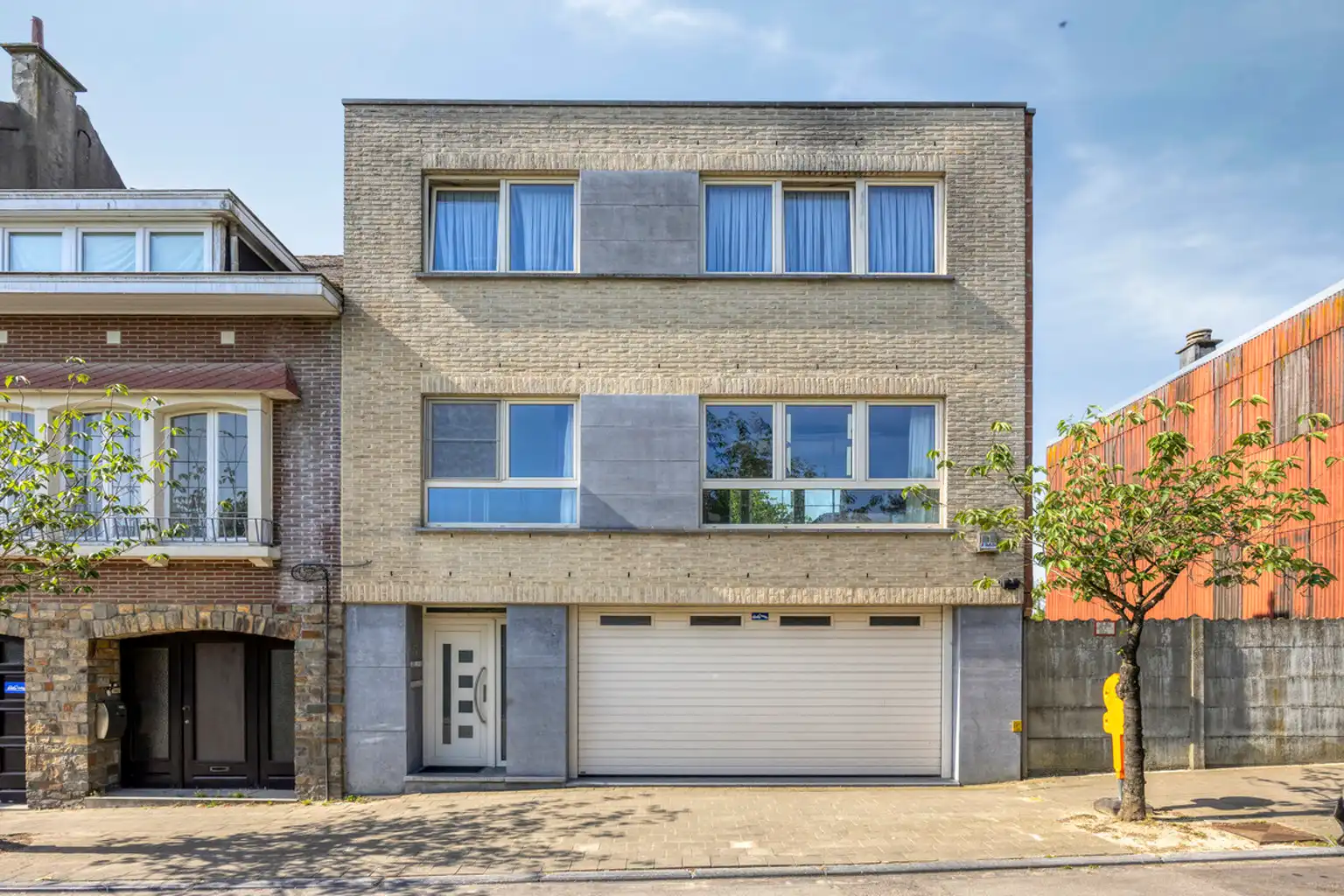 Duplexappartement met tuin en garage foto {{pictureIndex}}