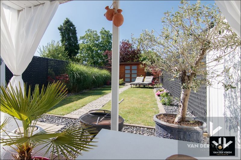 RUIME, VERZORGDE RIJWONING MET TOFFE STADSTUIN foto 9