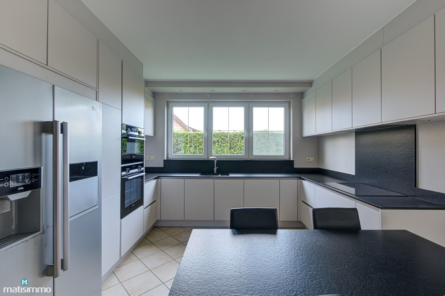 UITZONDERLIJK RUIME WONING MET 5 SLAAPKAMERS EN ONDERHOUDSVRIENDELIJKE TUIN TE MOPERTINGEN foto 7