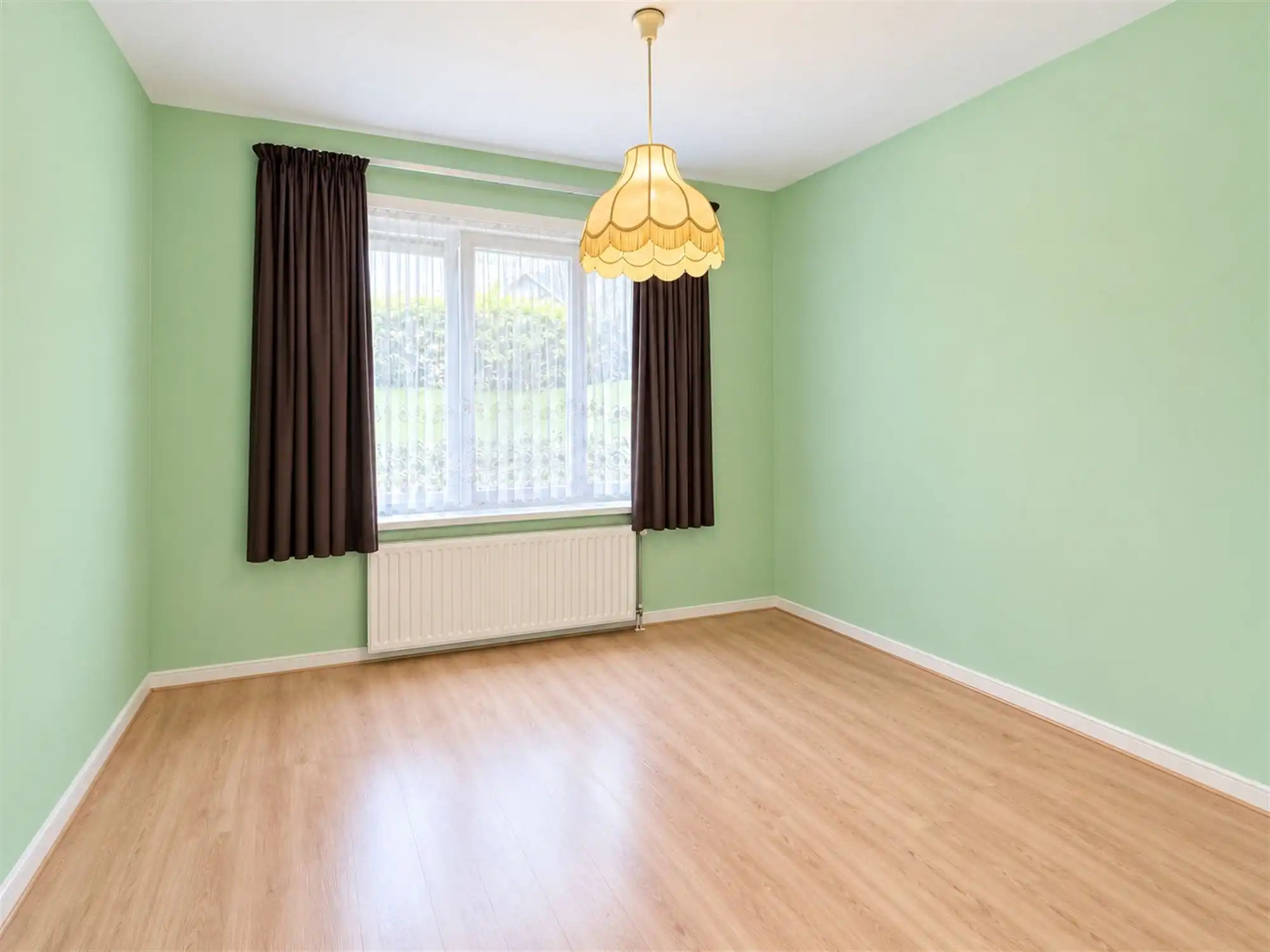 Gelijkvloers appartement met 2 slpk, garage en tuintje foto 10