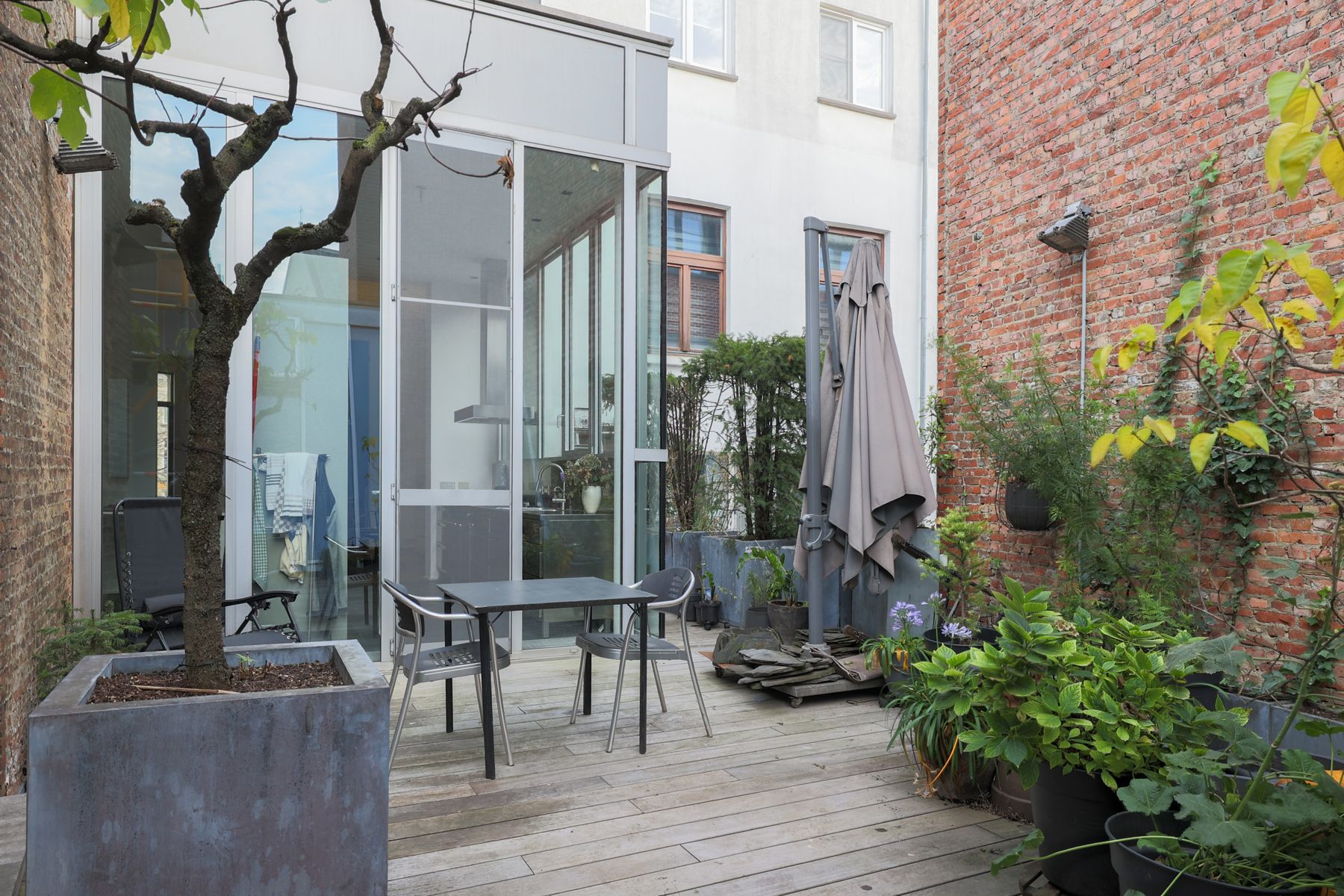 Triplex met stadsallure & buitenruimte aan het Mechelseplein foto 4