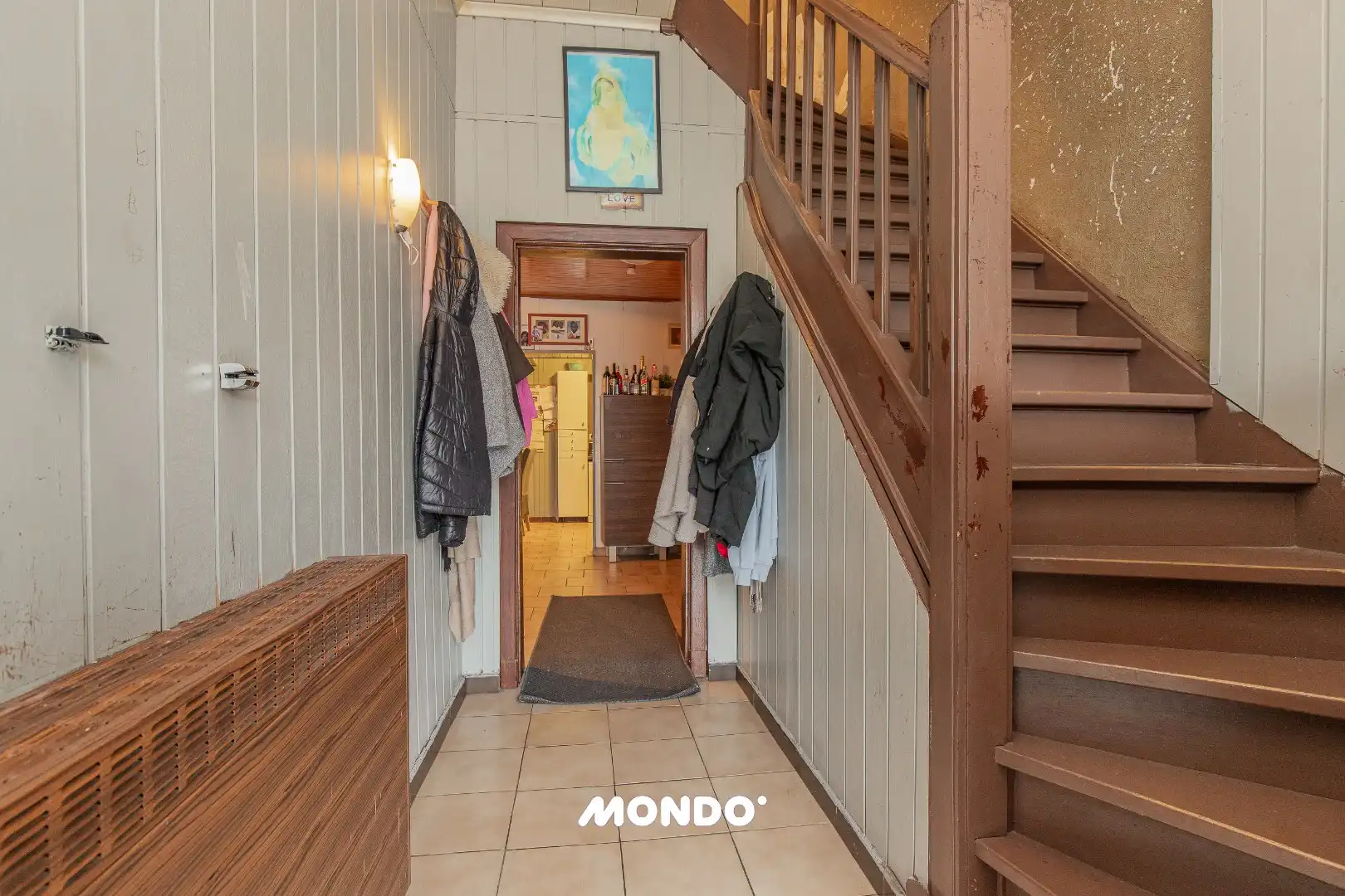 Deels gerenoveerde gezinswoning met 5 à 6 slaapkamers en tuin met achteruitweg foto 2