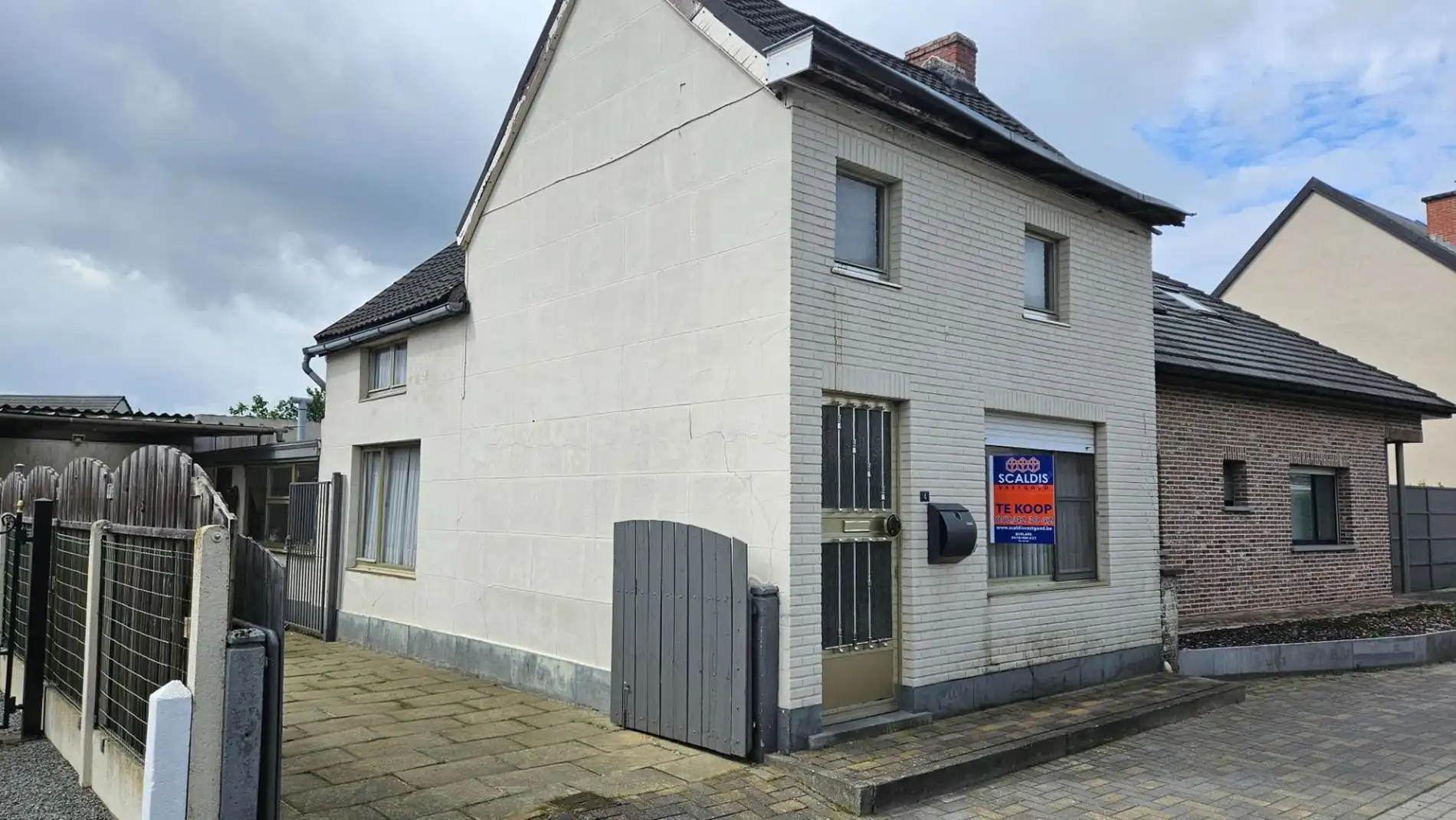 Renovatiewoning met 2 slk, garage en tuin  foto 2