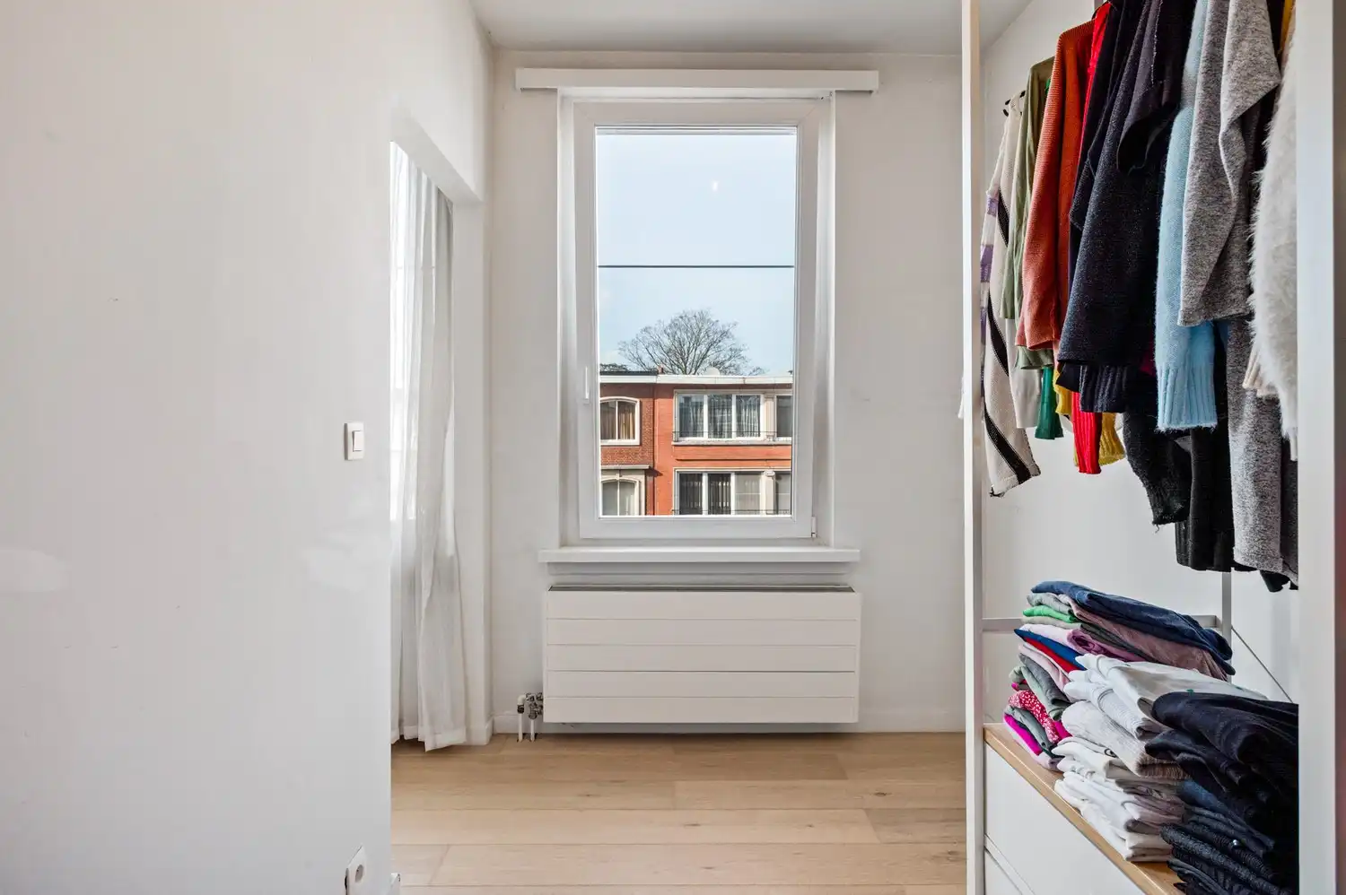 Charmant 2-slaapkamerappartement met terras in een rustige straat te Deurne foto 14