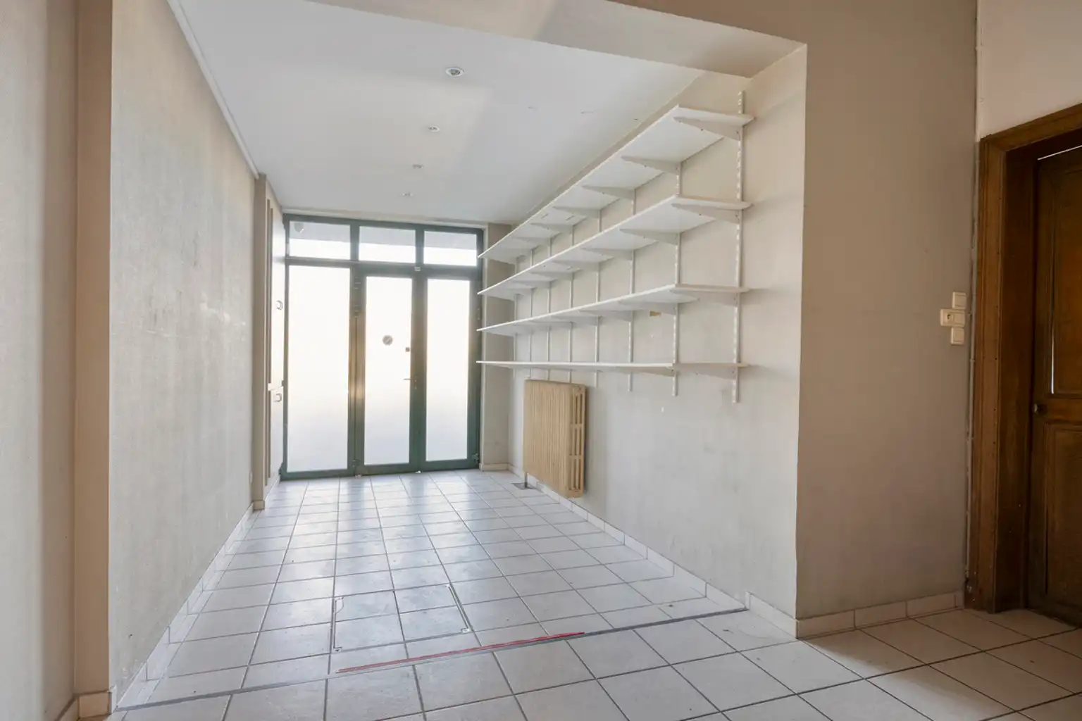 Uitstekend gelegen handelshuis met duplexwoonst  foto 9