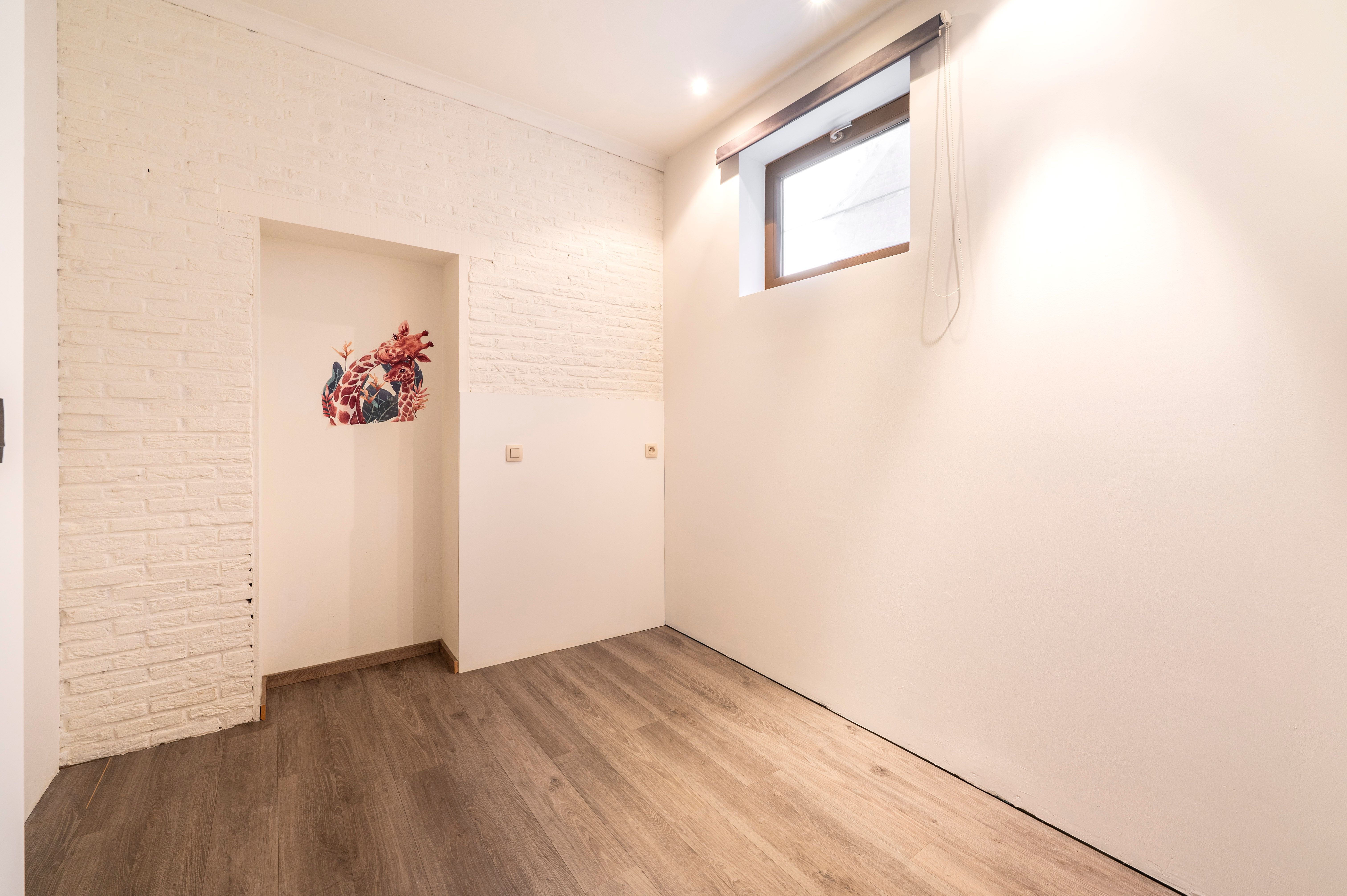 Verrassende woning met leuke tuin en grote garage nabij centrum Kapellen! foto 11