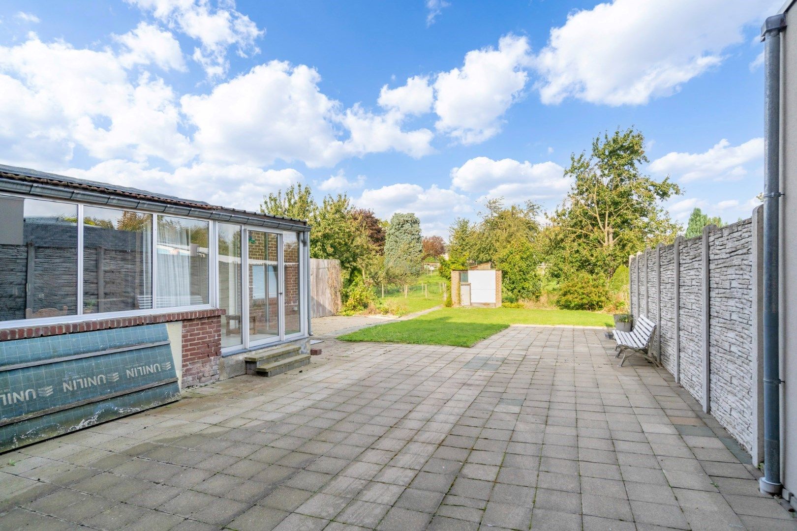 - IN OPTIE - Ruime degelijke rijwoning met doorrit naar de tuin met binnenkoer, op 12a10ca foto 41