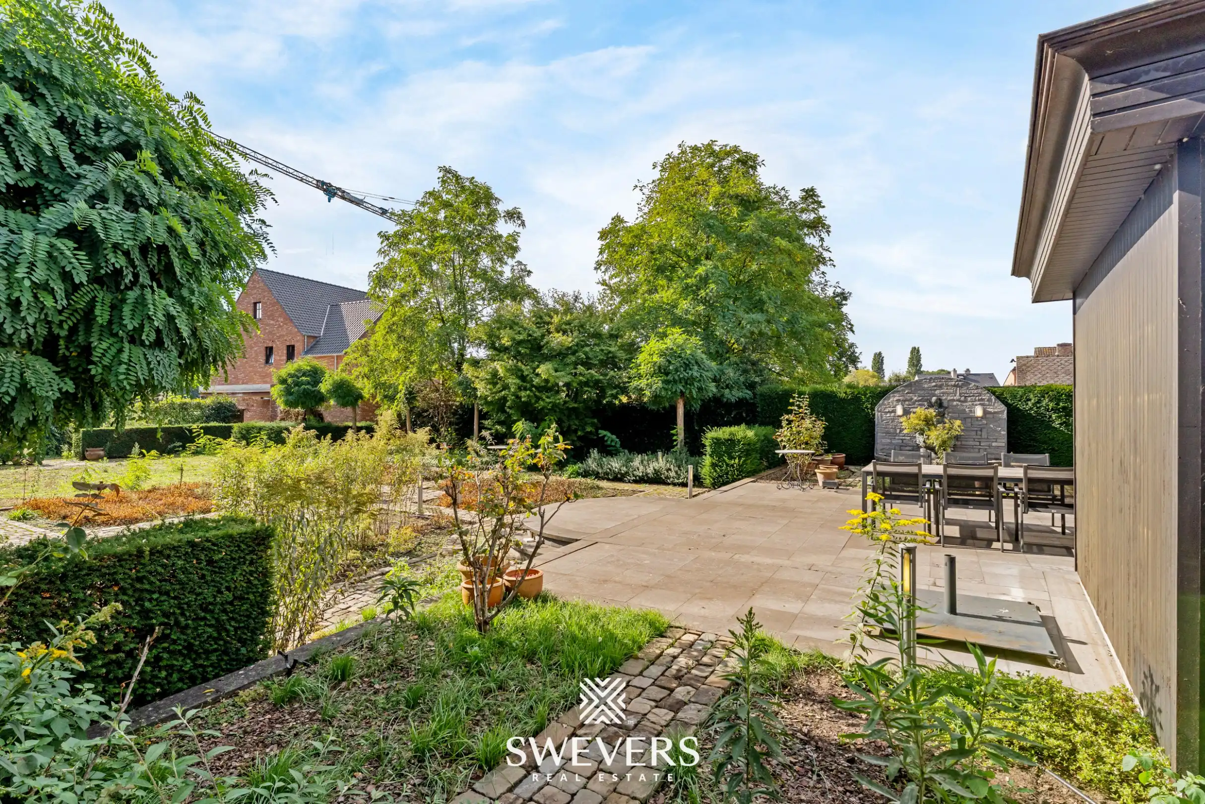 Knappe woning met orangerie, mogelijkheid tot 4 slpk en achterliggende bouwgrond foto 10