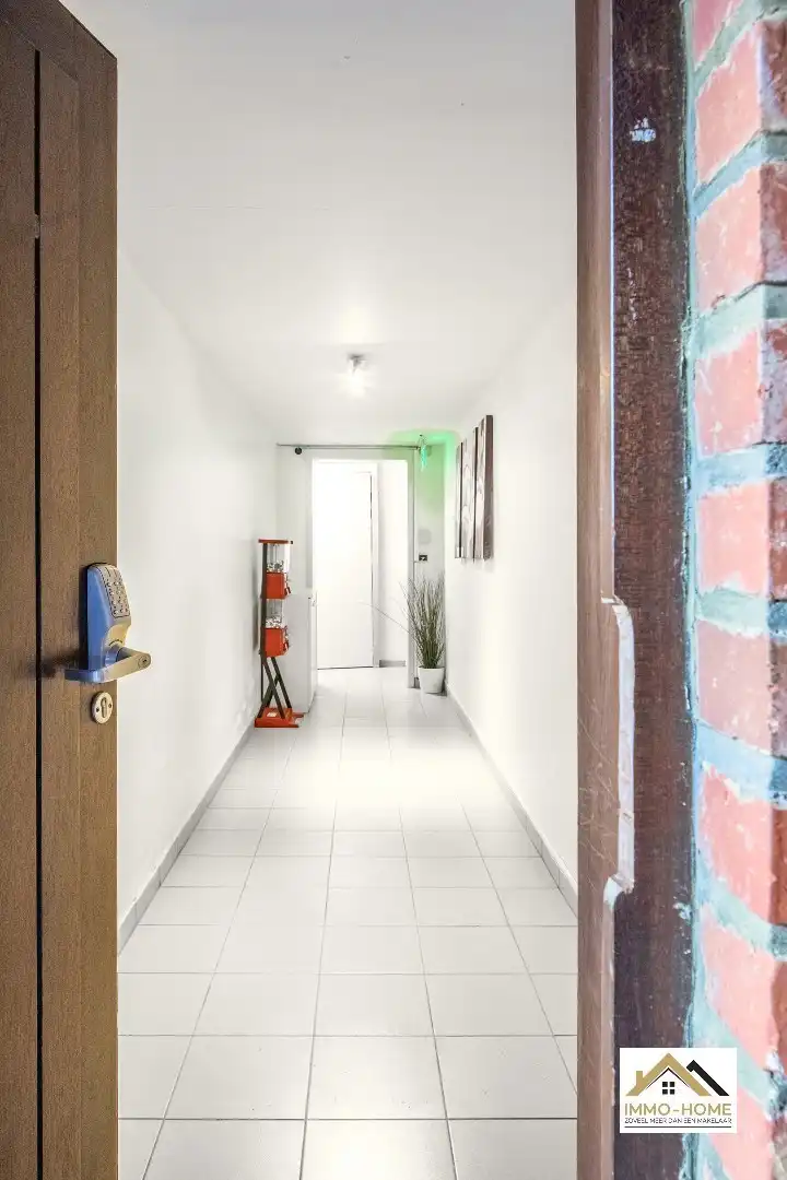 Zeer ruim gelijkvloers appartement met woonkelder en private tuin  foto 25