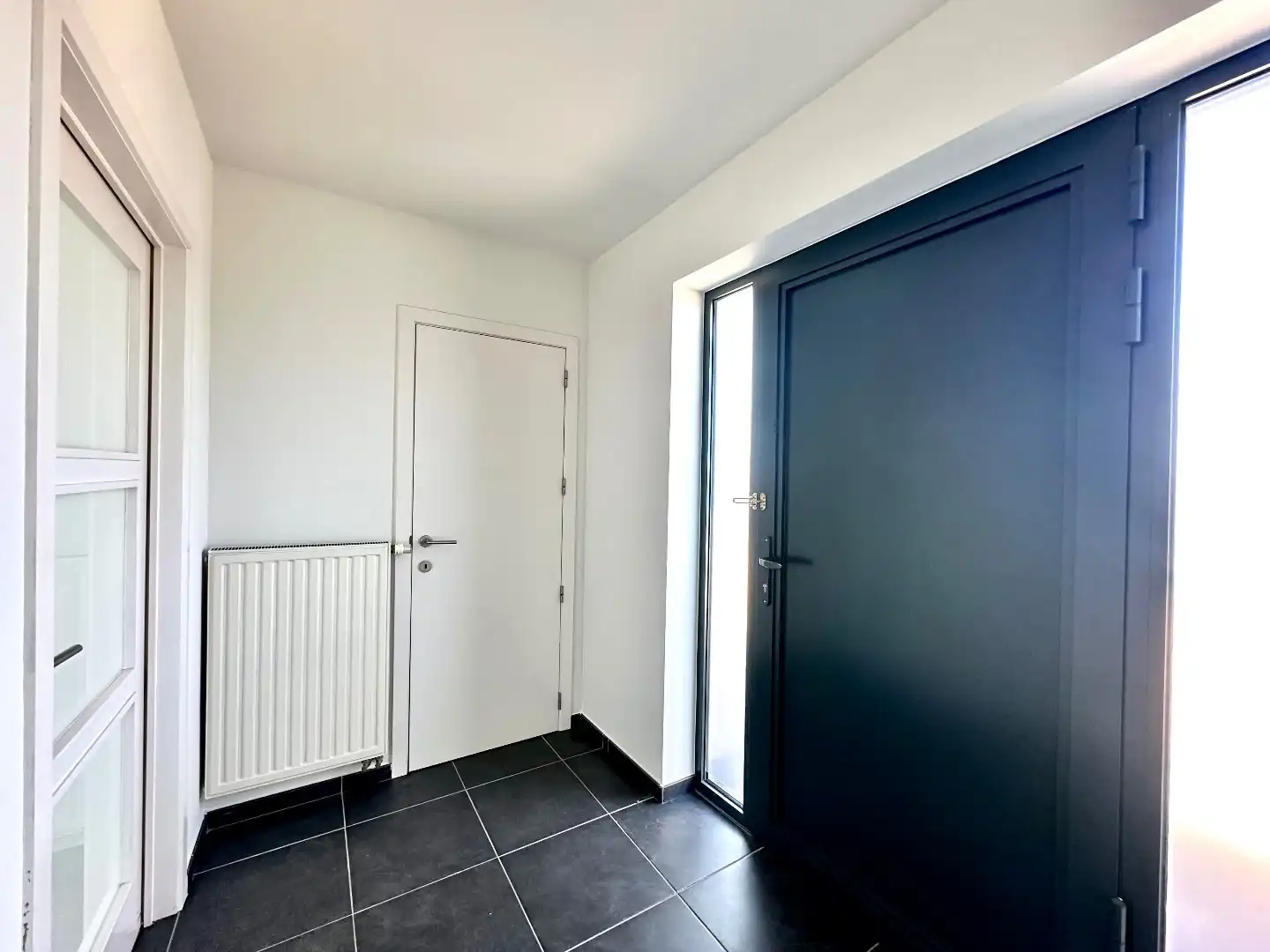 Ruim duplex appartement met 3 slaapkamers in hartje Bilzen-Hoeselt foto 2