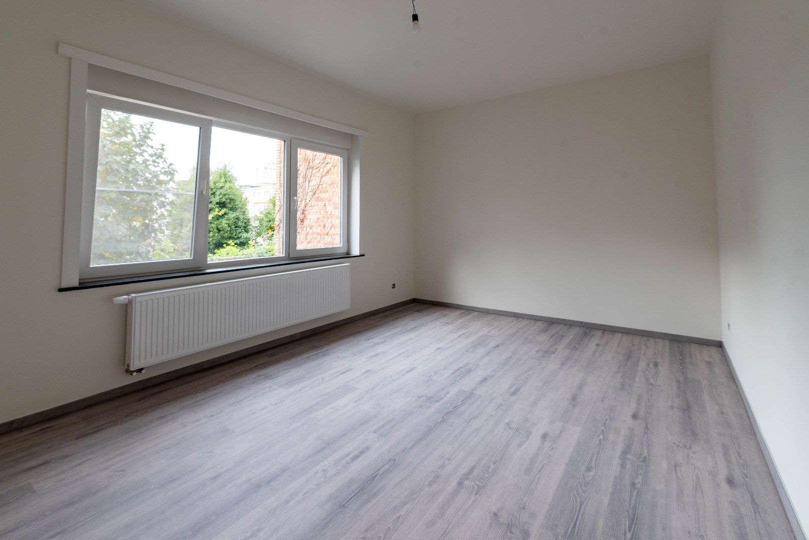 Opgefrist appartement met 2 slaapkamers foto 10