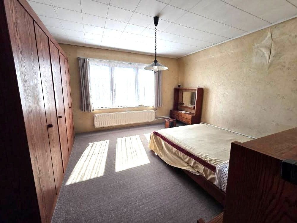 Te renoveren 4-gevelwoning in Peutie – Potentieel en perfecte ligging! foto 10