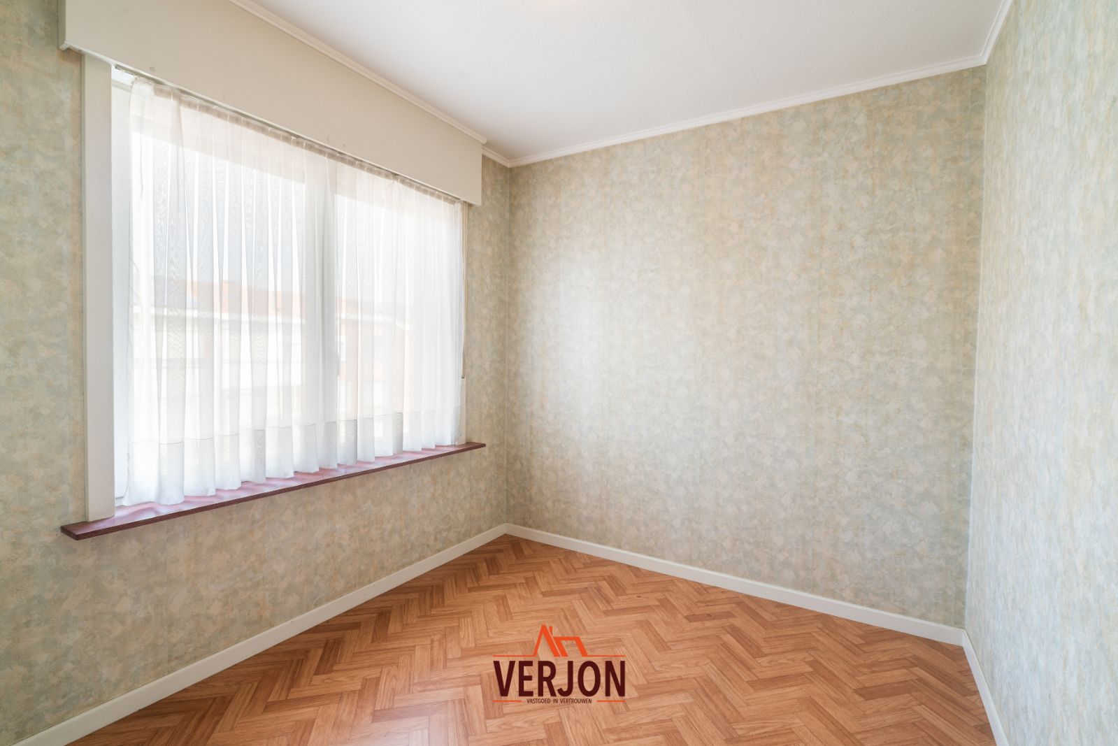 Woning met zuidgerichte tuin te koop in Kachtem! foto 12