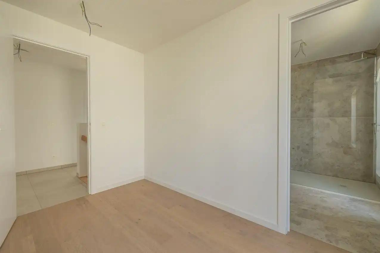 Instapklare nieuwbouwwoning met 4 slaapkamers, 2 badkamers en E-peil 9 foto 47