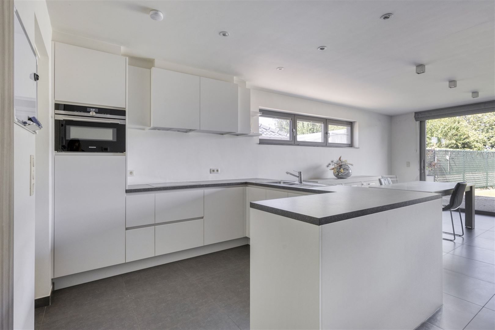 TE KOOP: Ruim appartement met tuin te Heusden-Zolder!  foto 4