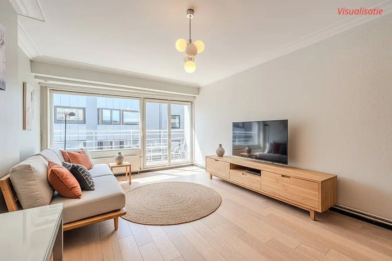 Lichtrijke studio te koop met zijdelings zeezicht en terras! foto 4