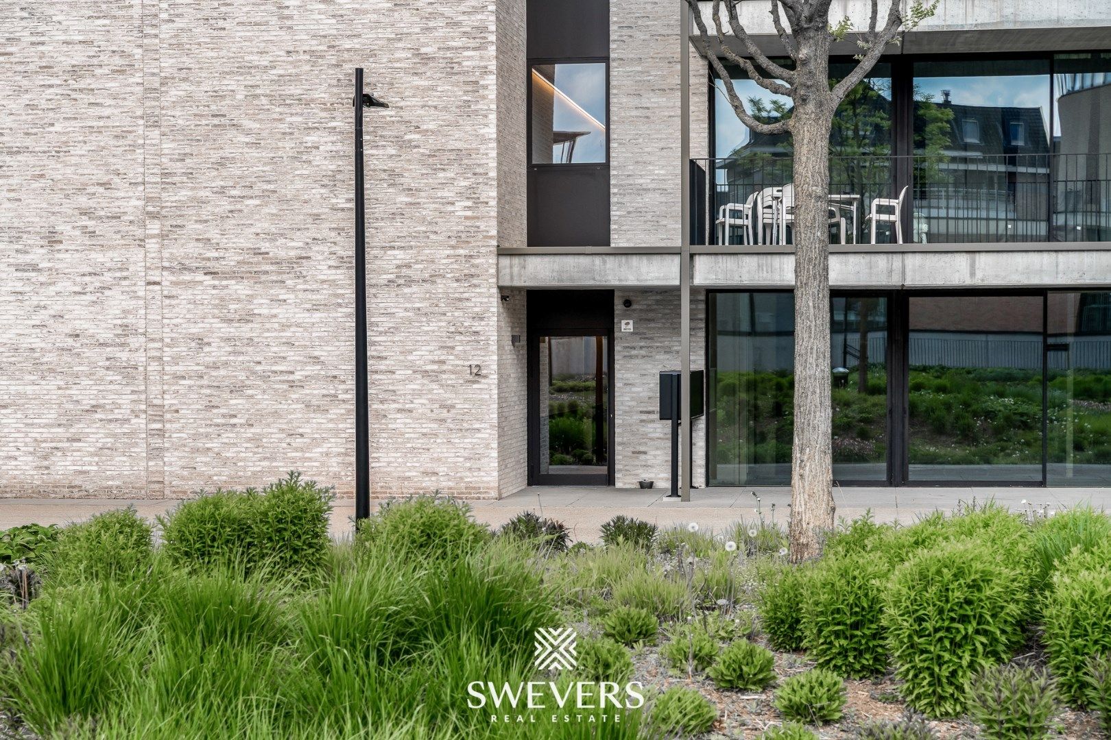 Modern nieuwbouwappartement met 2 slaapkamers en terras in centrum Beringen foto 24
