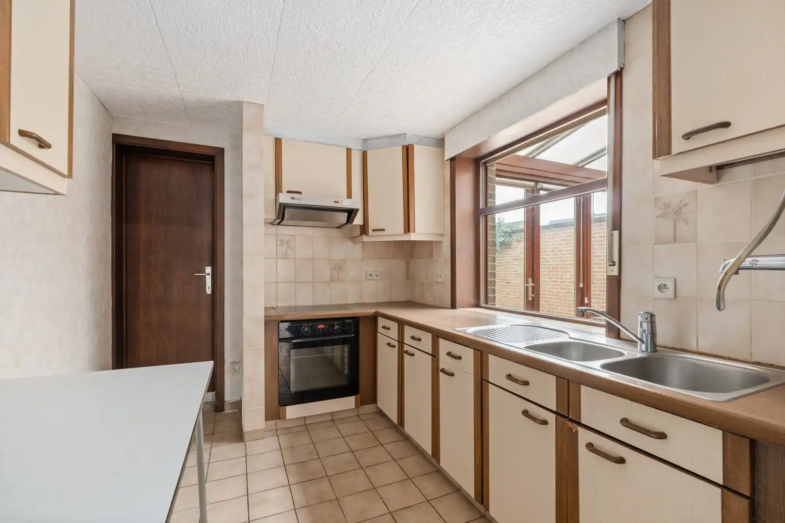 Halfopen woning met tuin en 3 slaapkamers foto 11