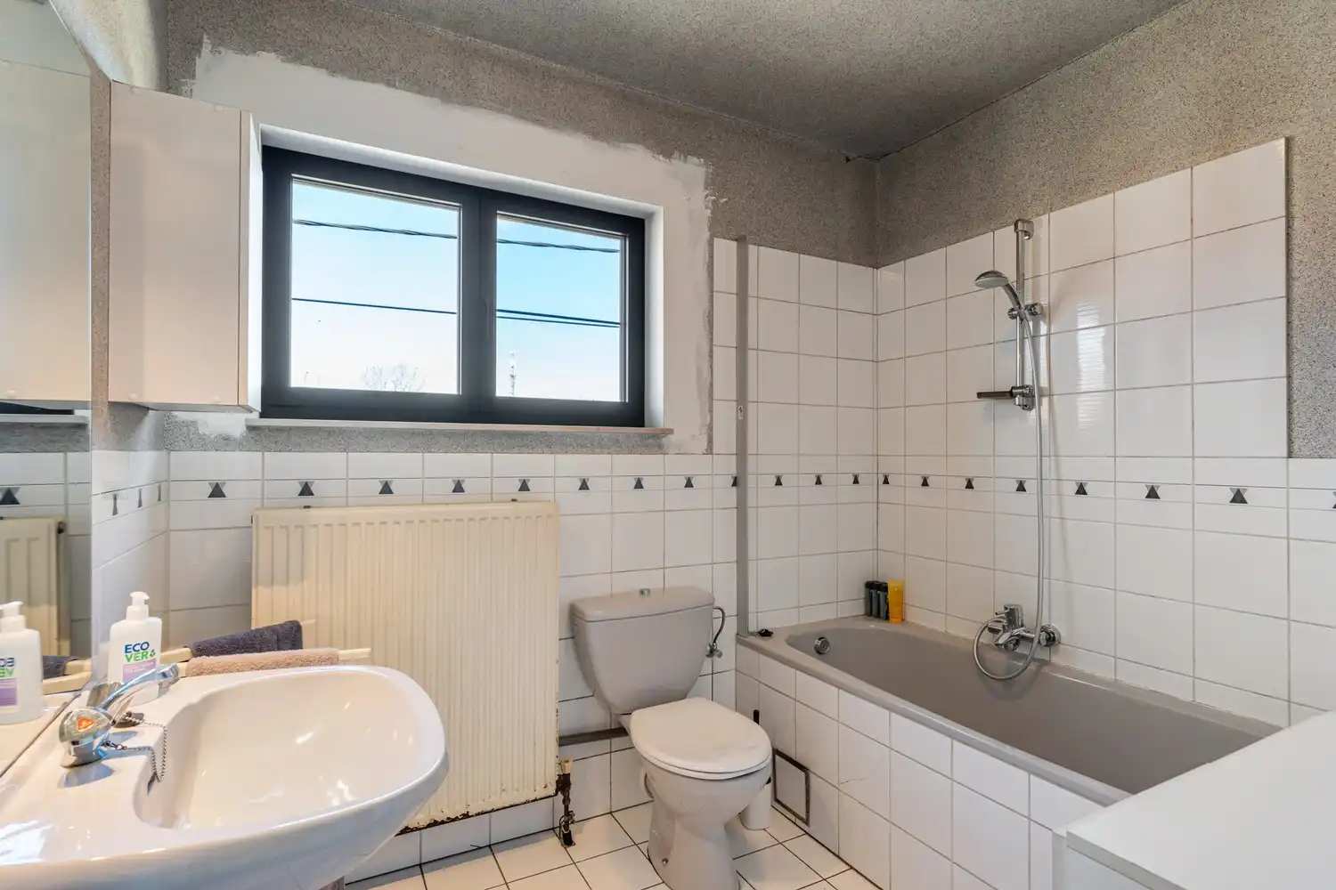 Goed gelegen en energiezuinige woning met 4 slaapkamers, een oprit met een garage en een tuin op de grens van Kessel-Lo en Holsbeek! foto 24