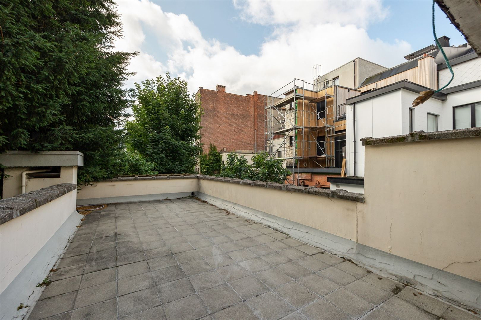 Opbrengstpand met 3 appartementen en garage nabij Harmonie en het Zuid foto 4