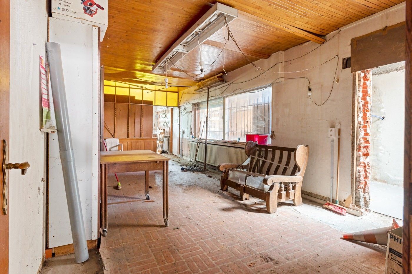 Te renoveren woning met 2 slpk., garage en grote tuin foto 4