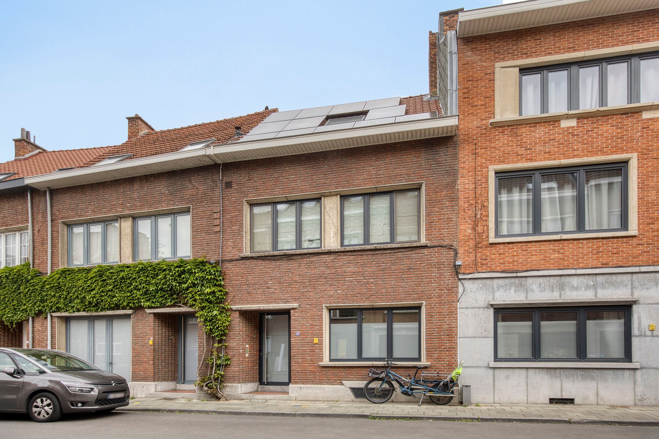 Uniek wonen in hartje Leuven met stille stadstuin foto {{pictureIndex}}