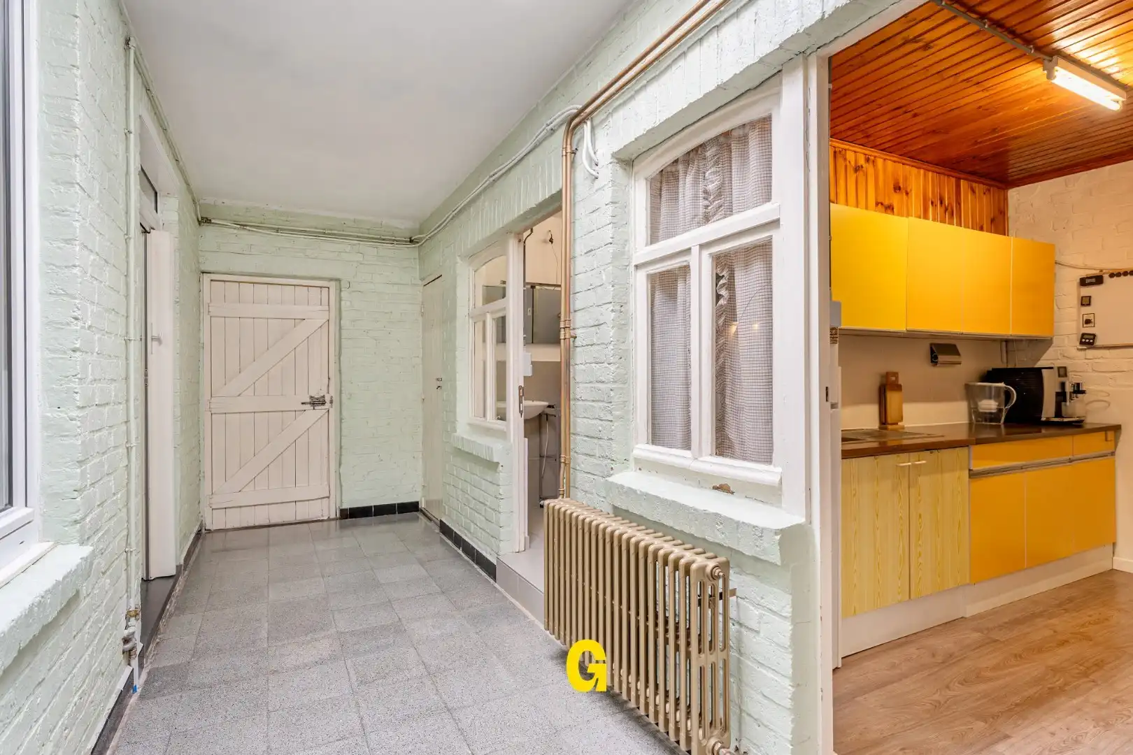 Te renoveren woning met 3 slaapkamers, inpandige garage en tuin foto 7