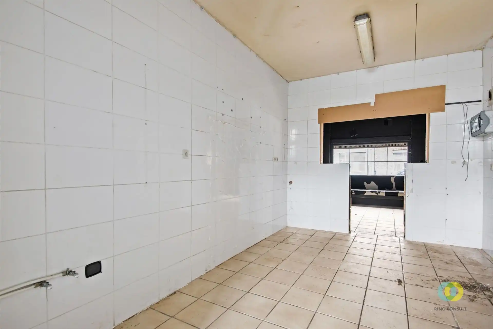 Handelshuis met bovenliggend duplexappartement foto 4