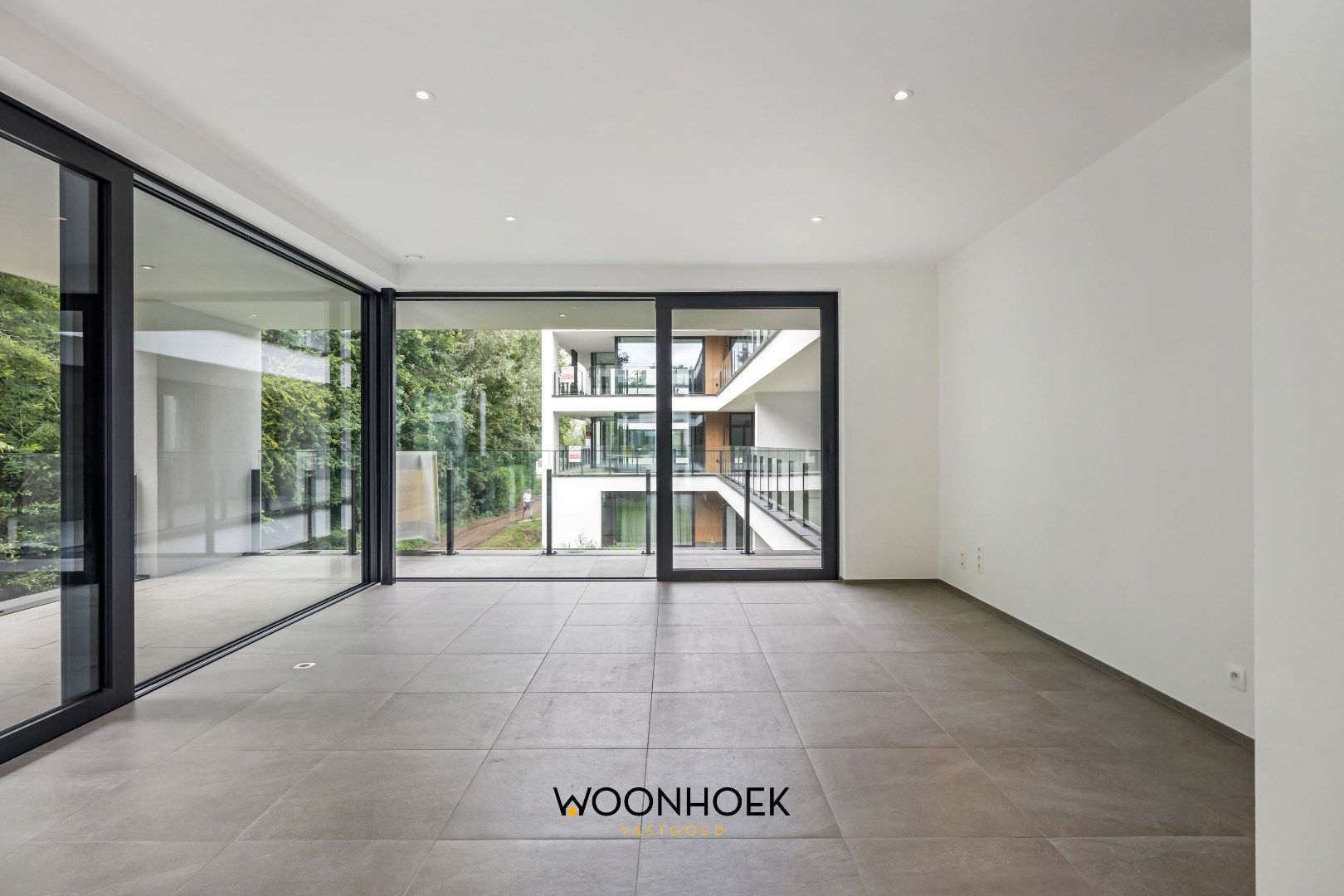 Luxueus 3-slpk nieuwbouwappartement OEVERPARK te Lokeren foto 4