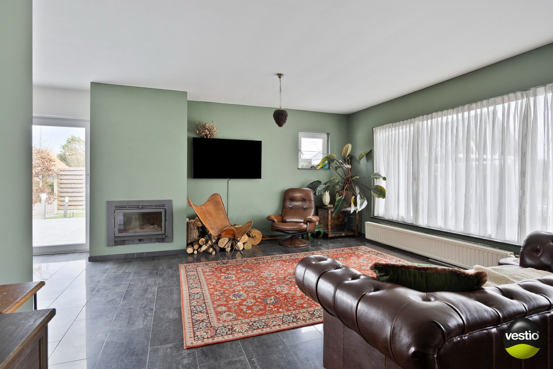 Instapklare, vrijstaande splitlevel-woning met 4 slaapkamers en praktijkruimte op de grens tussen Zutendaal en Lanaken foto 4