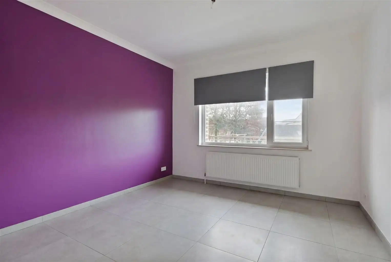 Zeer ruim 4-slaapkamerappartement met ruime terrassen en een afgesloten garage, gelegen nabij het centrum van Maaseik. foto 11