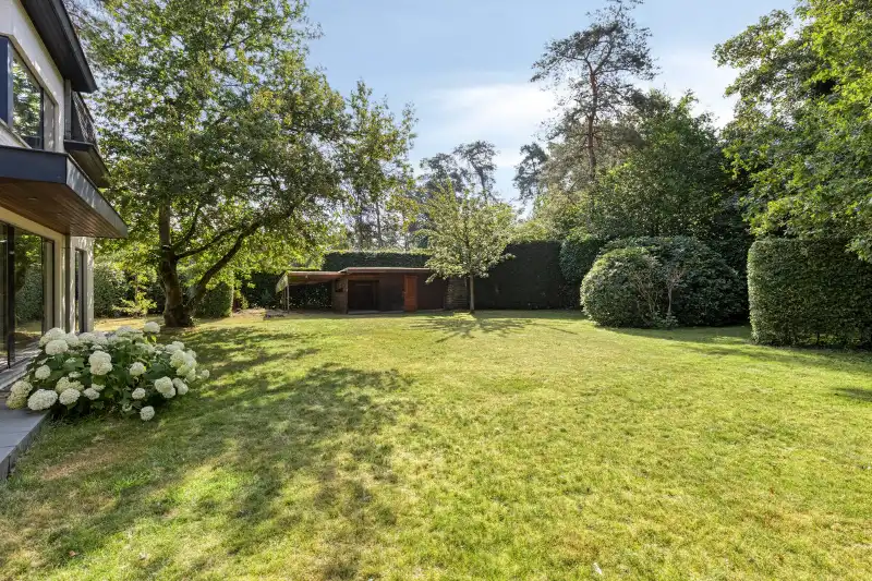 Villa met bewoonbare oppervlakte van 350m2 prachtig en rustig gelegen op perceel van 18a14 nabij het centrum van Bonheiden. foto 8