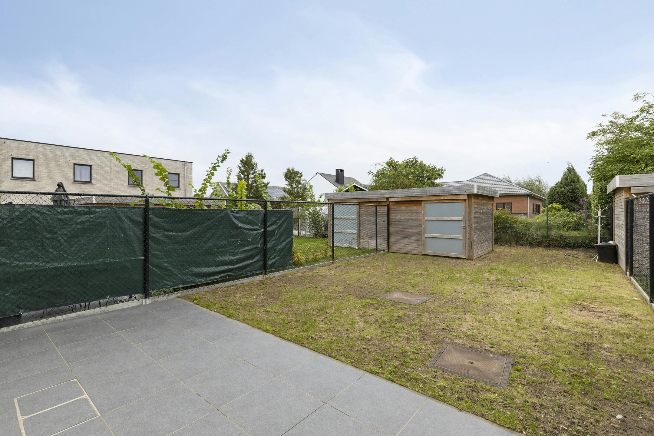 Instapklare woning met carport te koop in centrum Eeklo foto 15