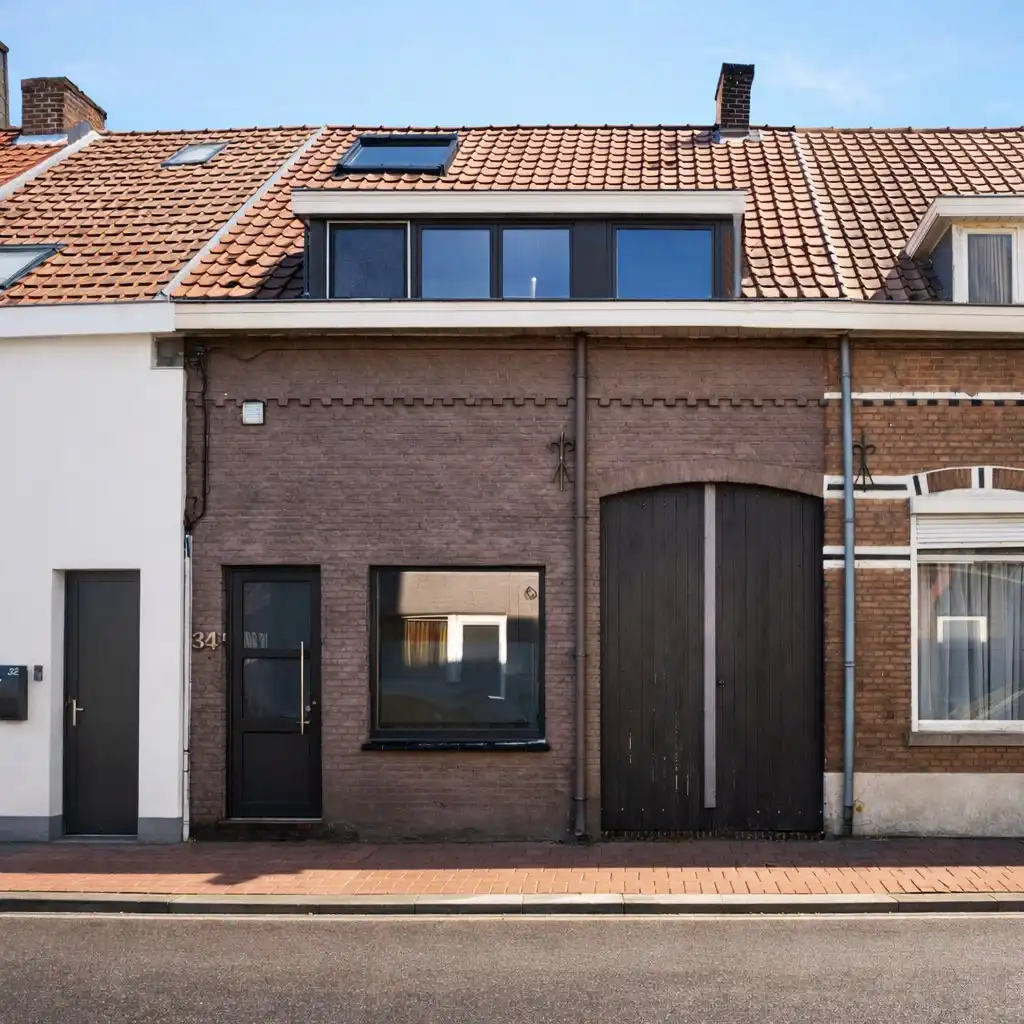 Rijwoning met zonnige tuin nabij centrum Maldegem. foto 9