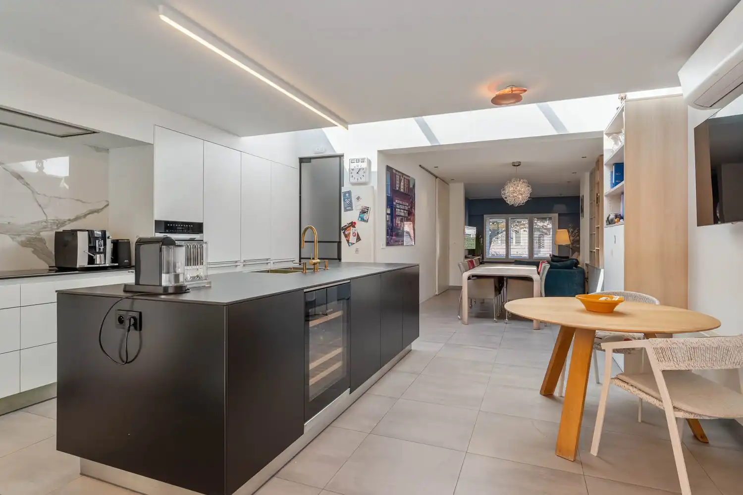 Gerenoveerde en energiezuinige(B-label) woning met 3 slaapkamers, 2 badkamers, een dressing, een garage met een oprit en een tuin nabij het station van Leuven! foto 10