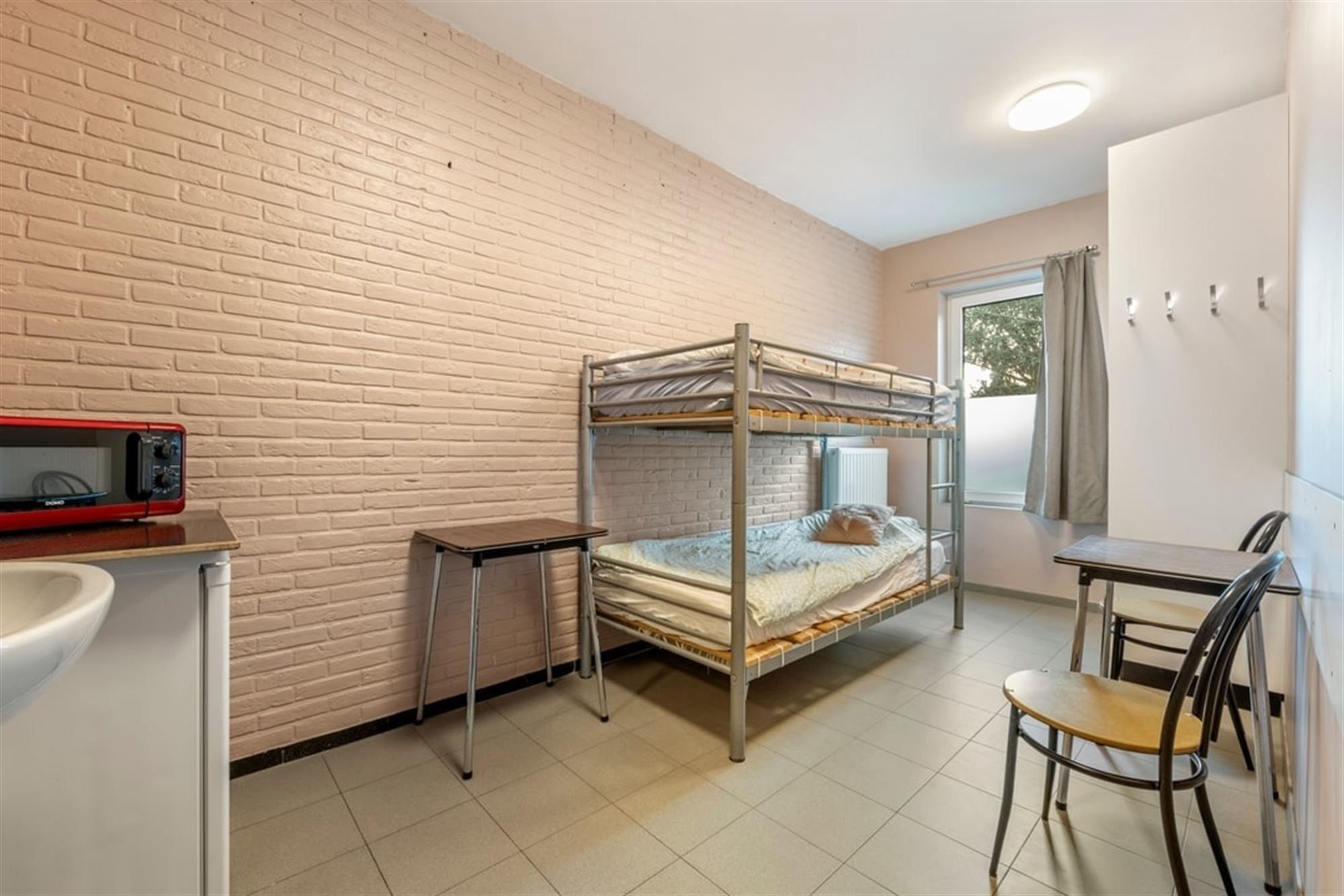 VERGUND GEMEENSCHAPSHUIS MET 15 INDIVIDUELE KAMERS foto 23