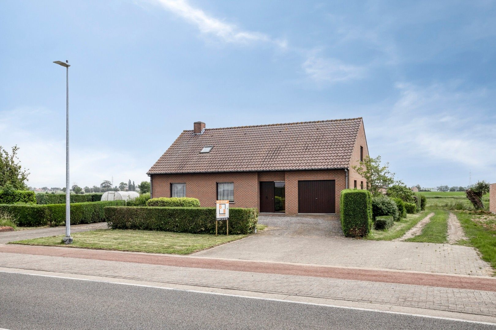 Hoofdfoto van de publicatie: Alleenstaande woning met grote tuin en weiland op 3.846 m²
