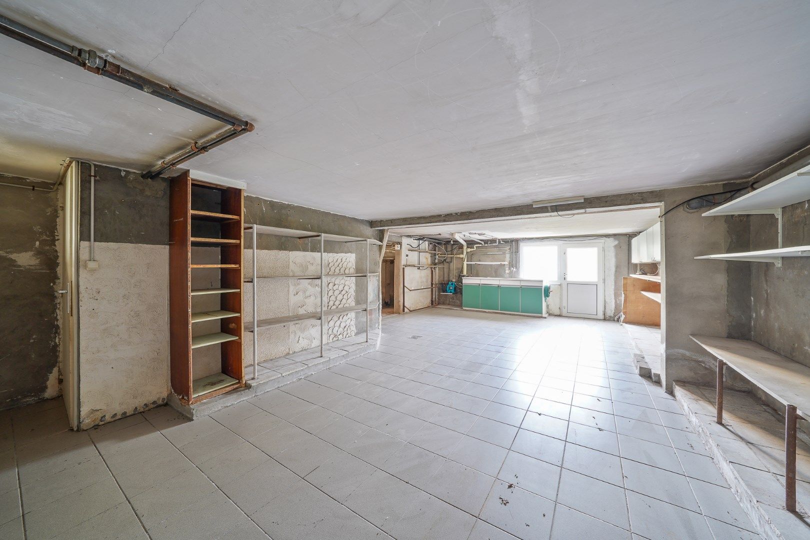 Te moderniseren woning met tuin en grote garage in Stene (Oostende) foto 13