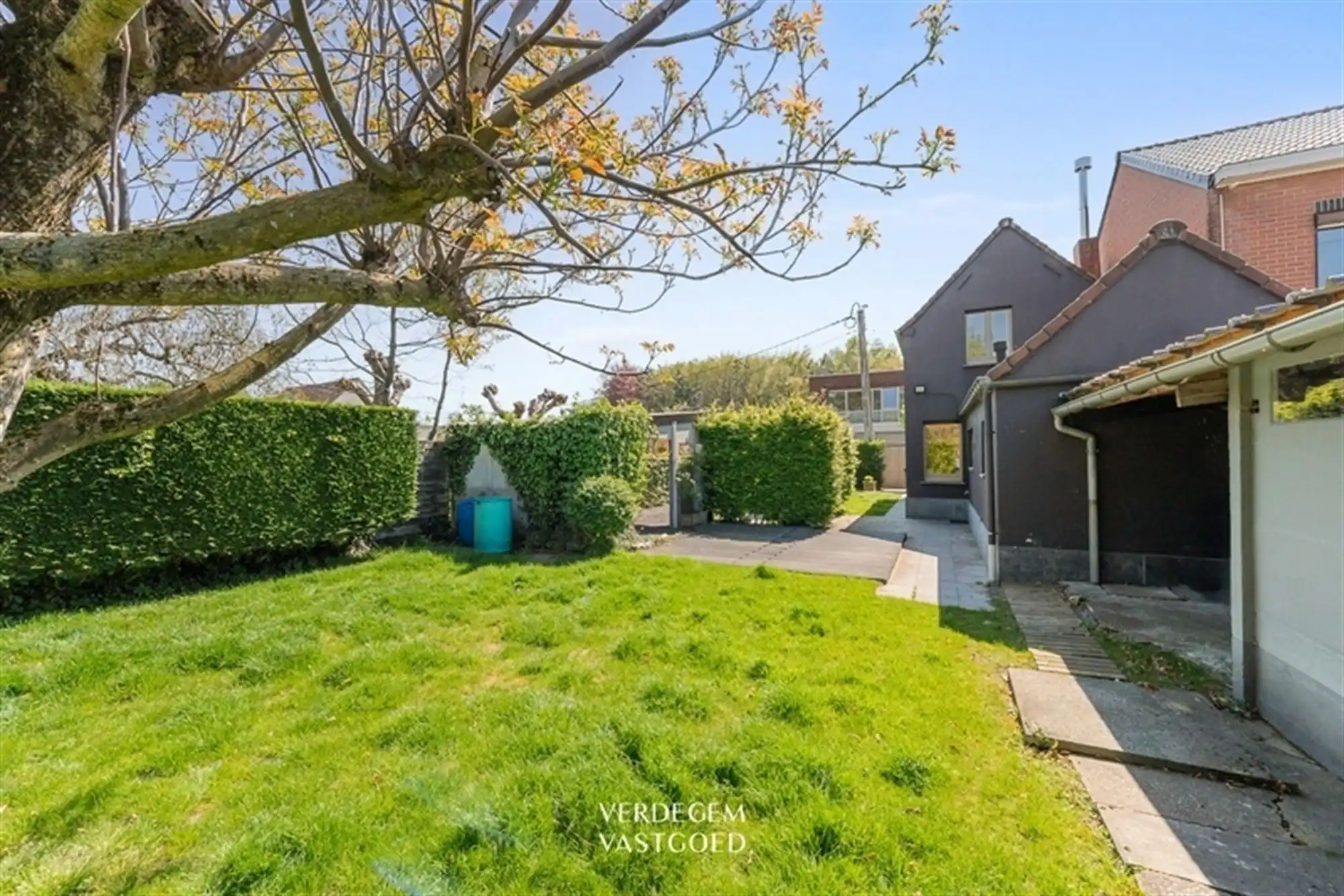 Charmante woning met 2 slaapkamers en fijne tuin met volledige privacy foto 13